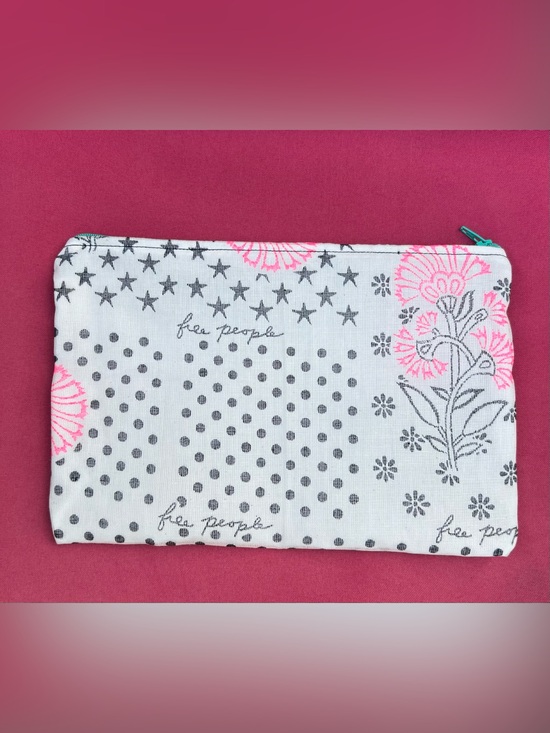 Free People Handbags - Upcycled shopping bag double lined Free People zip closure makeup bag